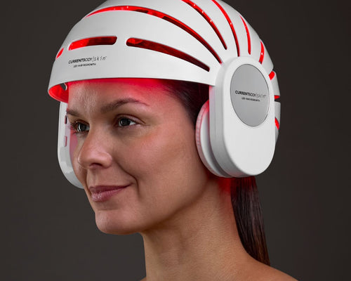 model in hair growth helmet