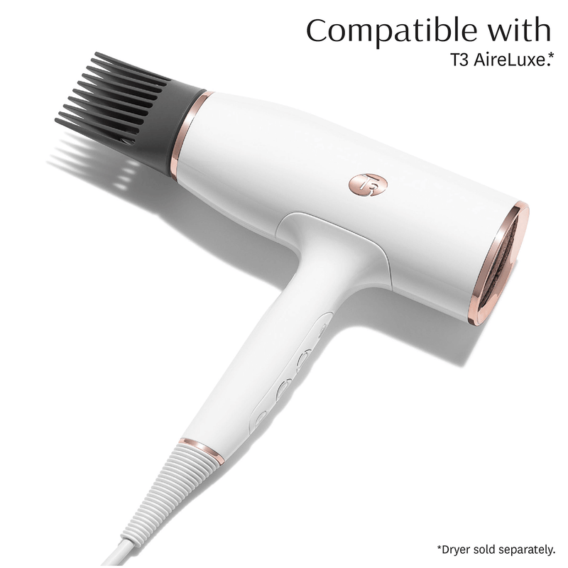 Hair dryer with outlet comb attached